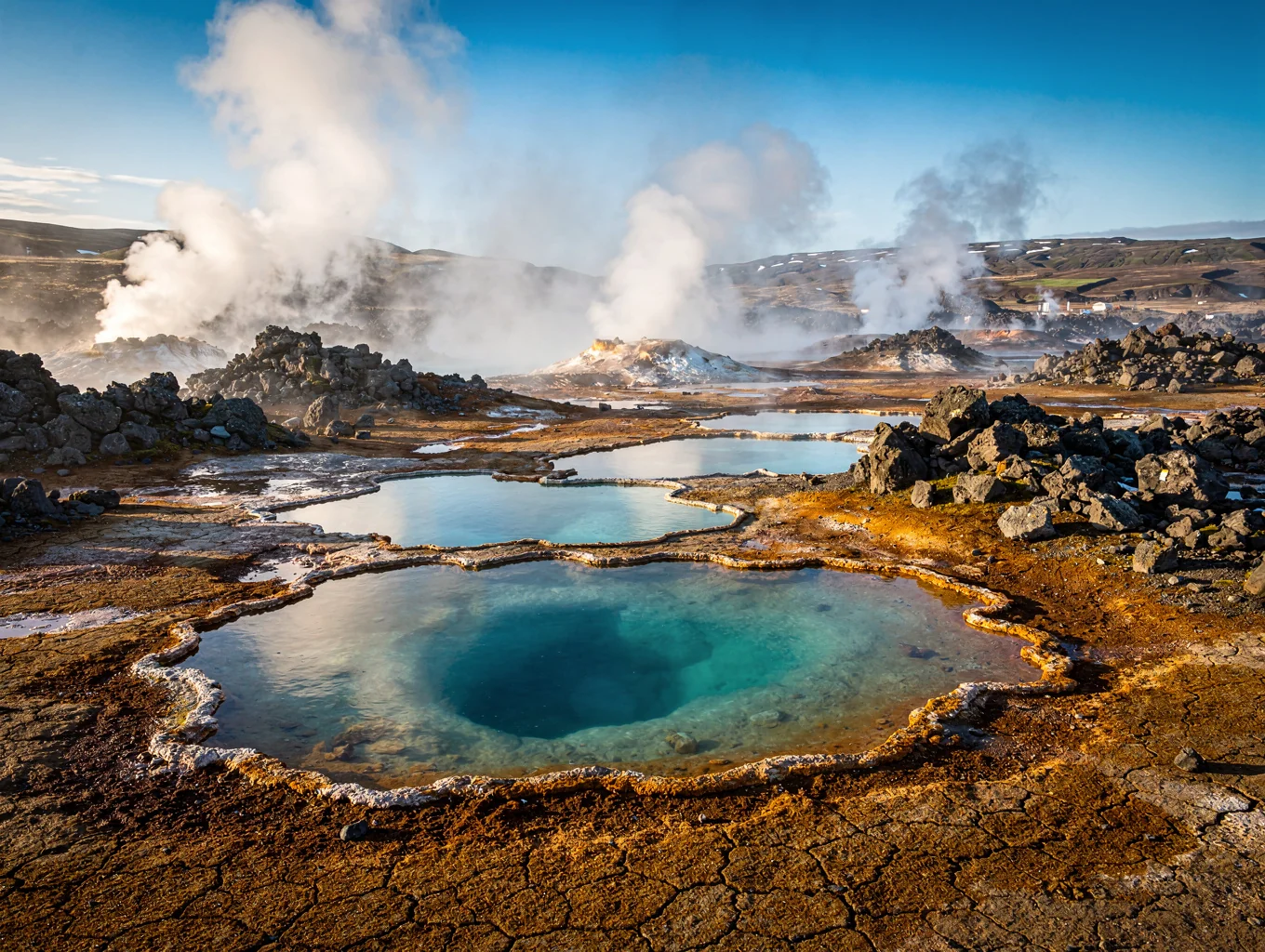 Geothermal caldera in Iceland with blue water